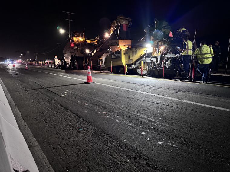 Night asphalt paving train